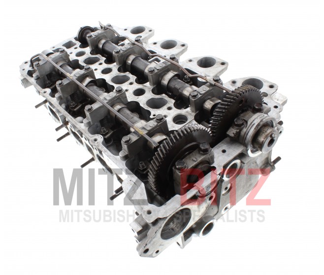 GENUINE BUILT UP CYLINDER HEAD ( PRESSURE TESTED AND SKIMMED ) FOR A MITSUBISHI PAJERO/MONTERO SPORT - KH4W