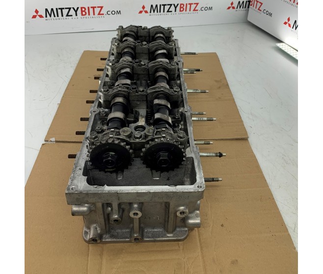 COMPLETE CYLINDER HEAD FOR A MITSUBISHI PAJERO - V98W