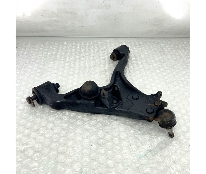 FRONT SUSPENSION ARM LOWER RIGHT FOR A MITSUBISHI FRONT SUSPENSION - 
