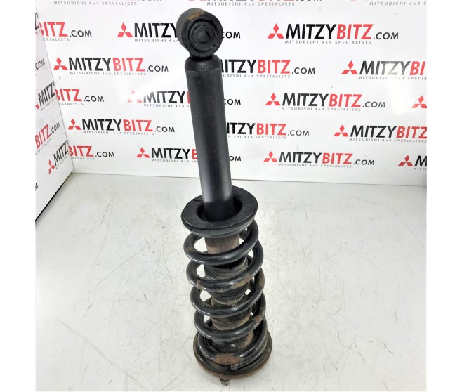 FRONT SHOCK ABSORBER AND COIL SPRING FOR A MITSUBISHI PAJERO/MONTERO - V68W
