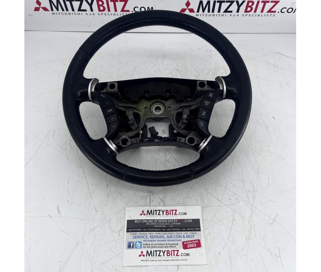LEATHER STEERING WHEEL FOR A MITSUBISHI PAJERO - V93W