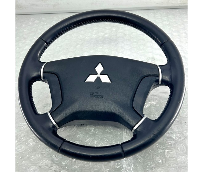 LEATHER STEERING WHEEL FOR A MITSUBISHI PAJERO - V88W