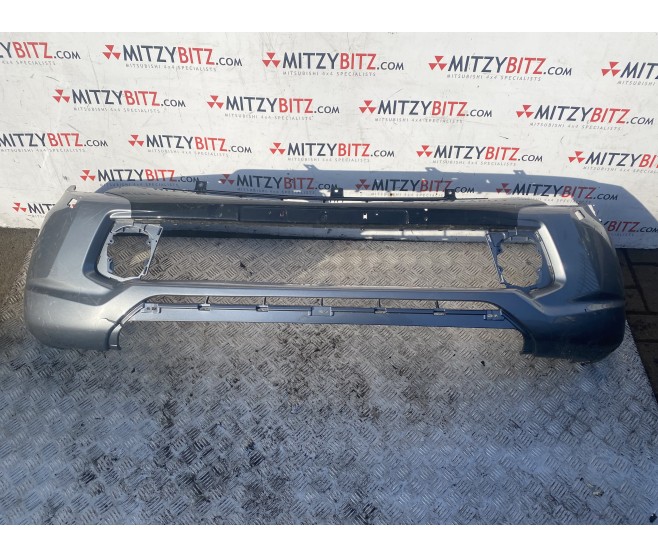 16-19 DAMAGED FRONT BUMPER FOR A MITSUBISHI BODY - 