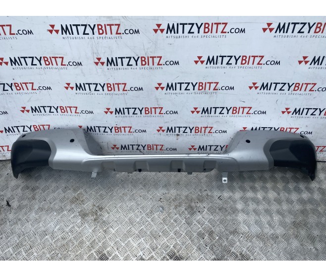 REAR BUMPER FACE ONLY  ( WITH SENSOR HOLES ) FOR A MITSUBISHI L200 - KL2T