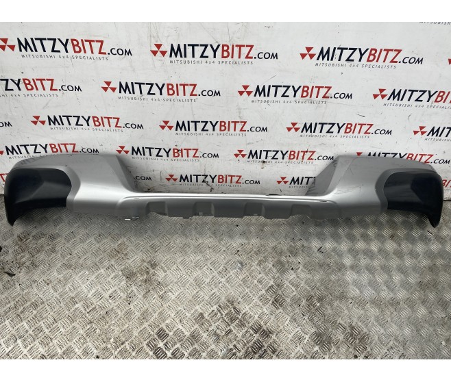 DAMAGED REAR BUMPER FACE ONLY FOR A MITSUBISHI KJ-L# - DAMAGED REAR BUMPER FACE ONLY