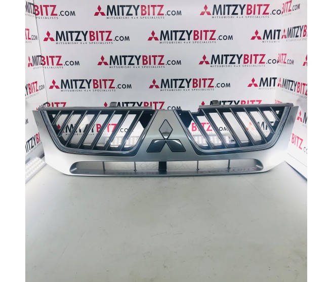RADIATOR GRILLE FOR A MITSUBISHI L200 - K77T