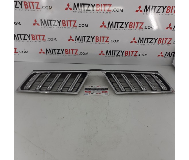FRONT CHROME GRILLES FOR A MITSUBISHI BODY - 