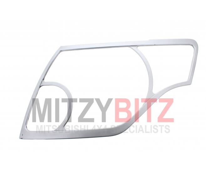 FRONT LEFT  CHROME HEADLAMP BEZEL TRIM FOR A MITSUBISHI CHASSIS ELECTRICAL - 