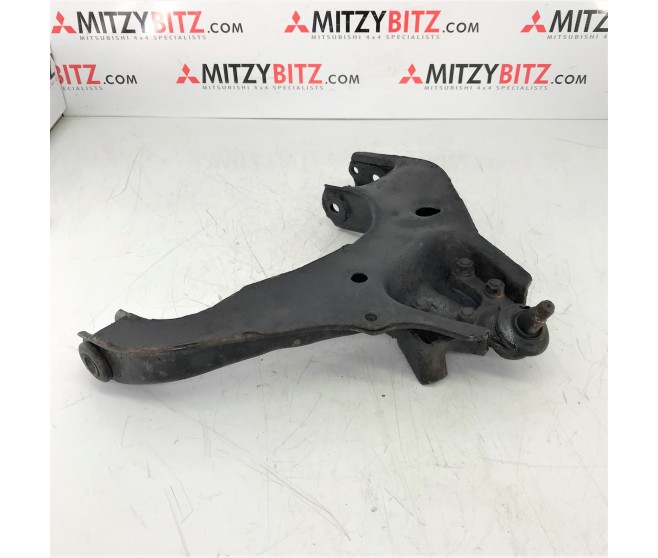 LOWER SUSPENSION ARM FRONT RIGHT FOR A MITSUBISHI L200 - K24T