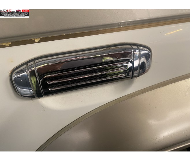 REAR LEFT CHROME DOOR HANDLE FOR A MITSUBISHI V20-50# - REAR LEFT CHROME DOOR HANDLE