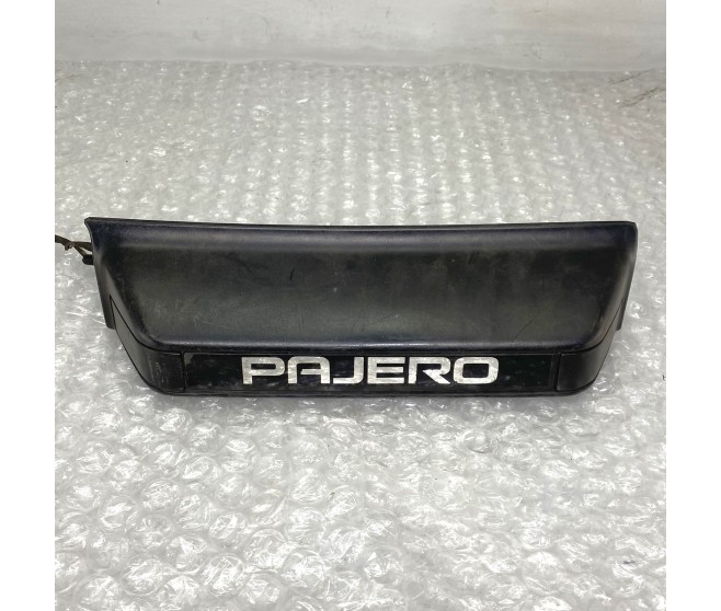 NUMBER PLATE TRIM REAR FOR A MITSUBISHI PAJERO - V45W