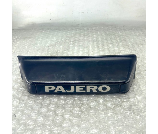 NUMBER PLATE TRIM REAR FOR A MITSUBISHI PAJERO - V23W