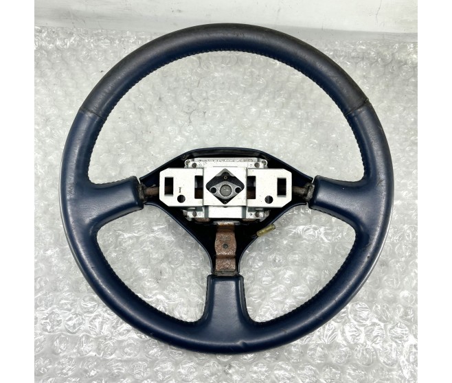 BLUE LEATHER STEERING WHEEL FOR A MITSUBISHI PAJERO - V43W