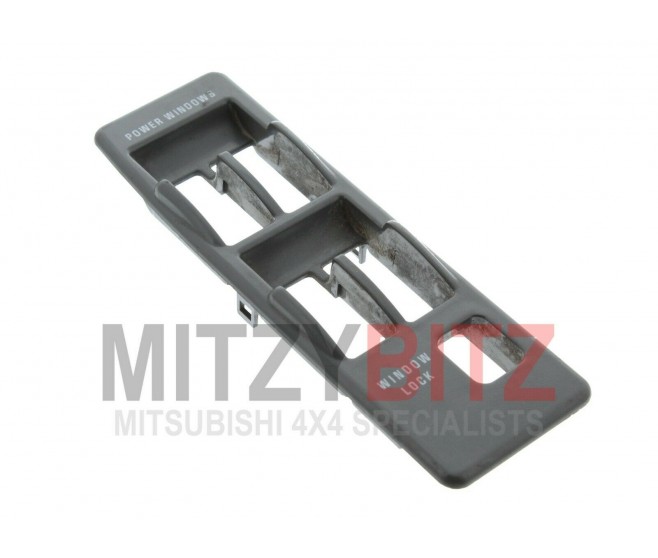 GREY WINDOW SWITCH FASCIA FOR A MITSUBISHI CHASSIS ELECTRICAL - 