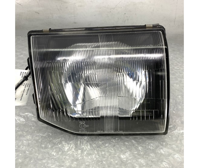 FRONT RIGHT HEADLAMP FOR A MITSUBISHI V20-50# - FRONT RIGHT HEADLAMP