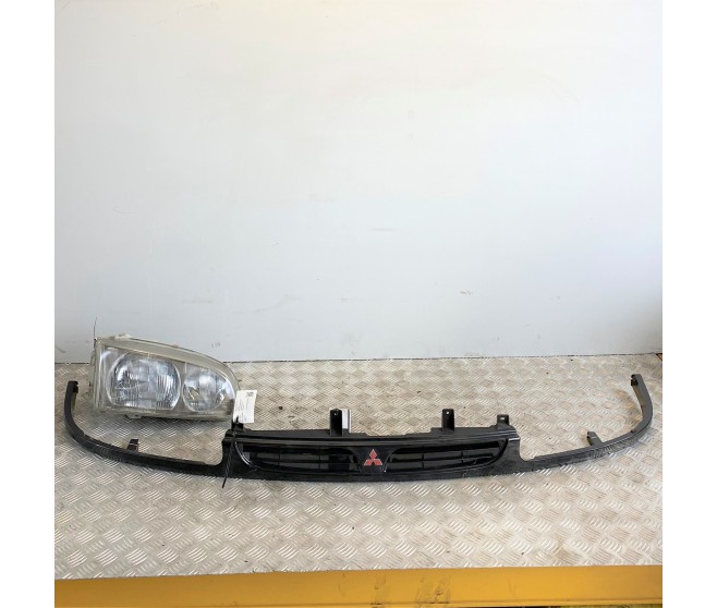 RADIATOR GRILLE AND HEADLAMP FOR A MITSUBISHI V70# - RADIATOR GRILLE AND HEADLAMP
