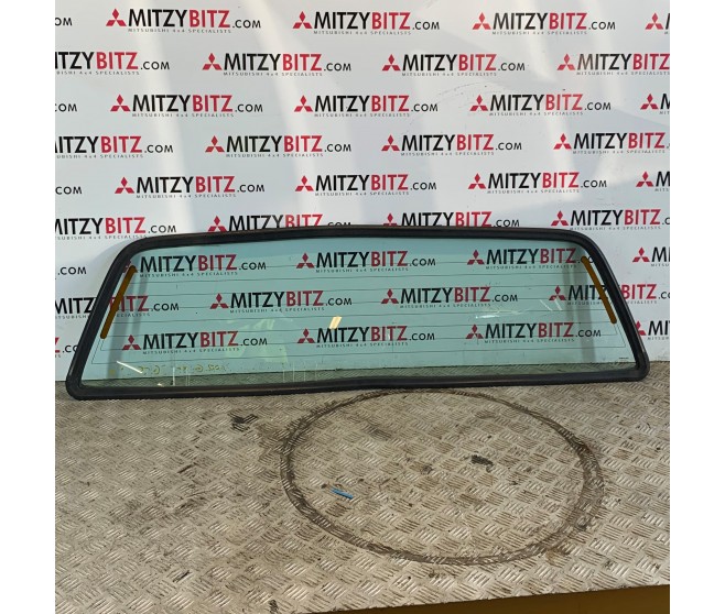 REAR CAB GLASS FOR A MITSUBISHI K60,70# - REAR WINDOW GLASS & MOULDING