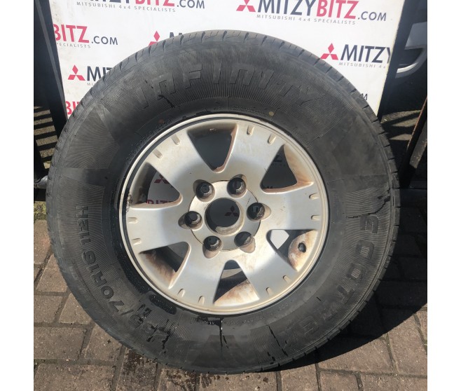 ALLOY WHEEL AND TYRE 16 FOR A MITSUBISHI PAJERO - V68W