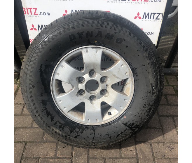 ALLOY WHEEL AND TYRE 16 FOR A MITSUBISHI PAJERO - V68W