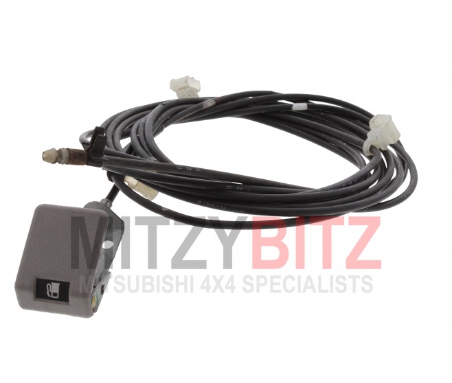 FUEL FILLER LID LOCK RELEASE AND CABLE FOR A MITSUBISHI L200 - KB4T