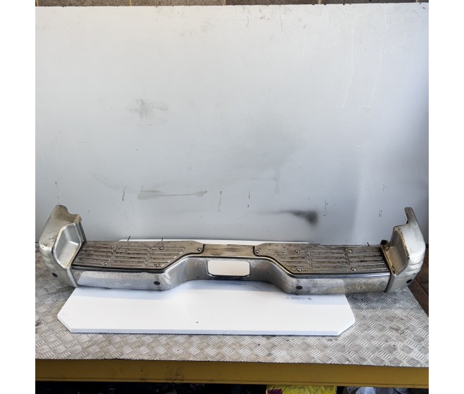 REAR BUMPER WITH END CAPS FOR A MITSUBISHI BODY - 