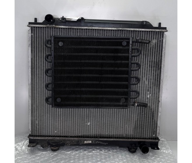 AFTERMARKET RADIATOR WITH BUILT IN COOLER FOR A MITSUBISHI PA-PF# - RADIATOR,HOSE & CONDENSER TANK
