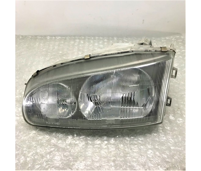 FRONT LEFT HEADLIGHT FOR A MITSUBISHI DELICA SPACE GEAR/CARGO - PD8W