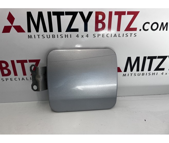 FUEL FILLER LID FOR A MITSUBISHI BODY - 