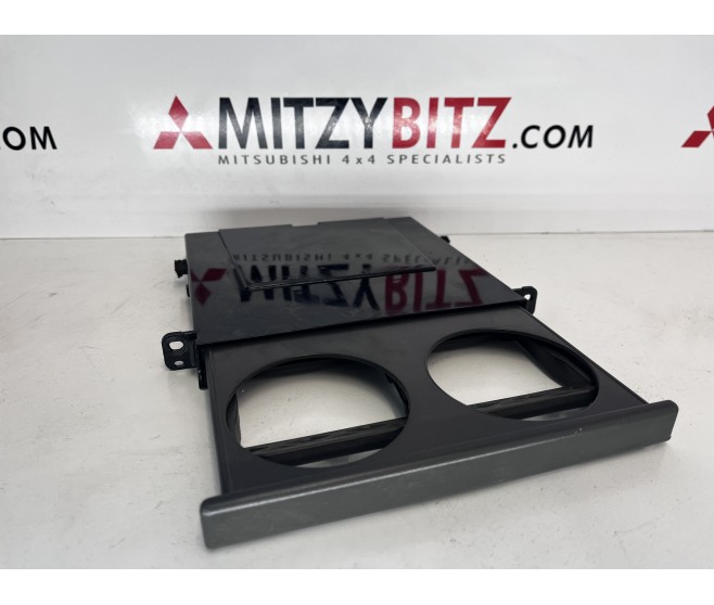 CUP HOLDER  FOR A MITSUBISHI L200 - K75T