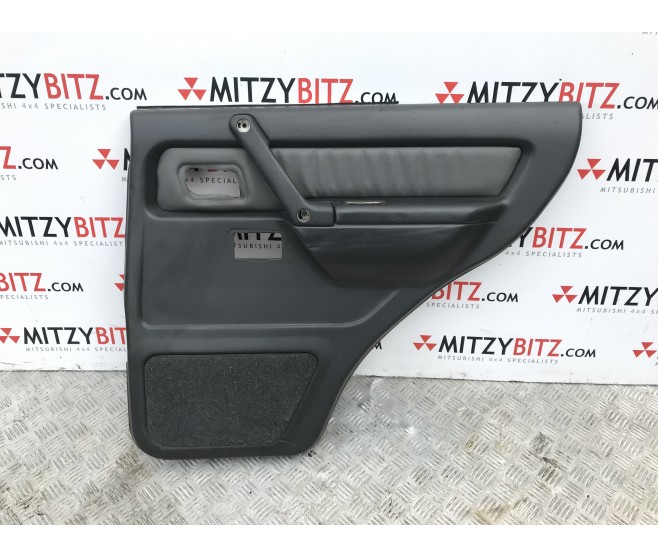 REAR RIGHT DOOR CARD GREY LEATHER  FOR A MITSUBISHI V10-40# - REAR DOOR TRIM & PULL HANDLE
