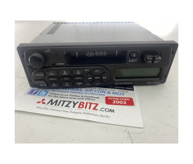 STEREO RADIO TAPE PLAYER  FOR A MITSUBISHI L200 - K74T