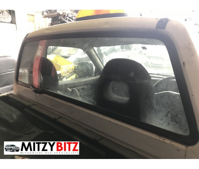 REAR CAB WINDOW GLASS ONLY FOR A MITSUBISHI K60,70# - REAR CAB WINDOW GLASS ONLY
