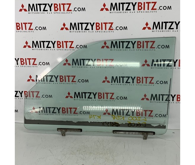 FRONT LEFT DOOR DROP GLASS FOR A MITSUBISHI L200 - K72T