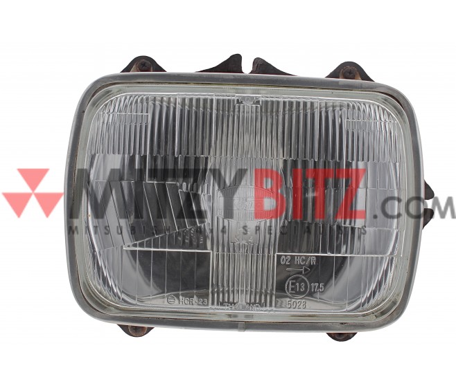 KOITO HEAD LAMP  FRONT RIGHT FOR A MITSUBISHI CHASSIS ELECTRICAL - 