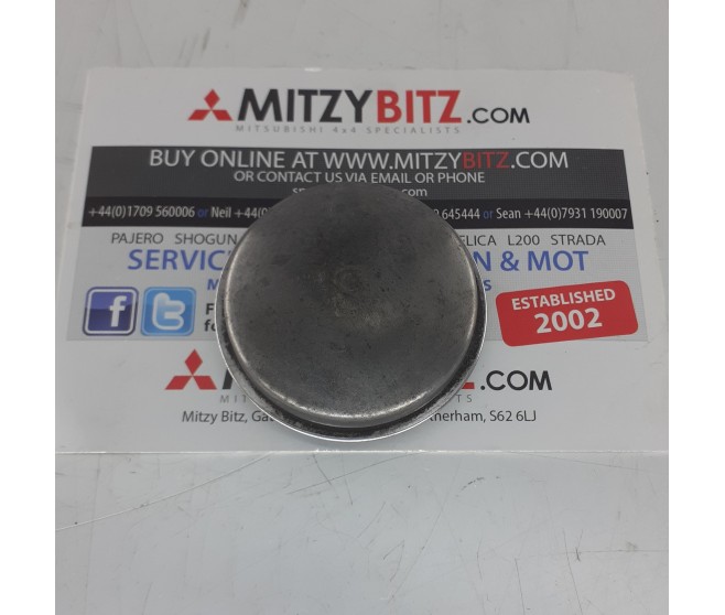 FRONT WHEEL HUB CAP FOR A MITSUBISHI FRONT AXLE - 