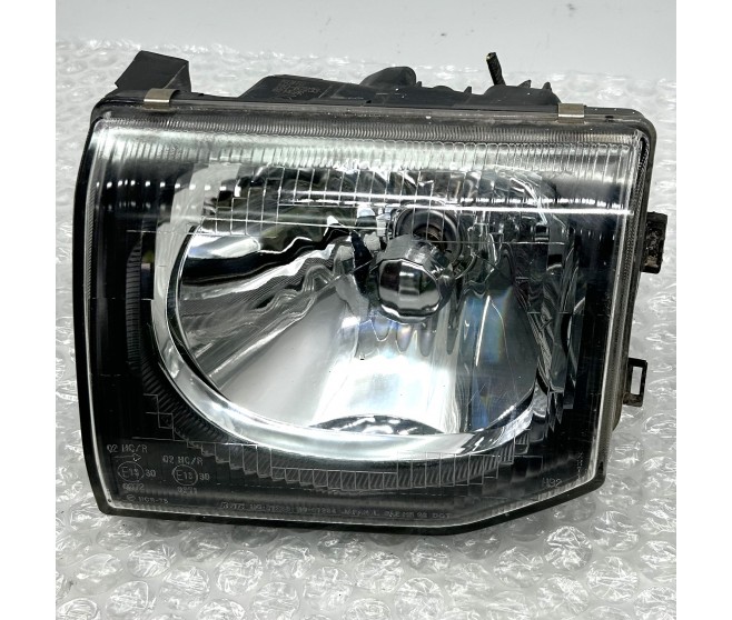 FRONT LEFT HEADLAMP CLEAR LENS FOR A MITSUBISHI PAJERO - V25W