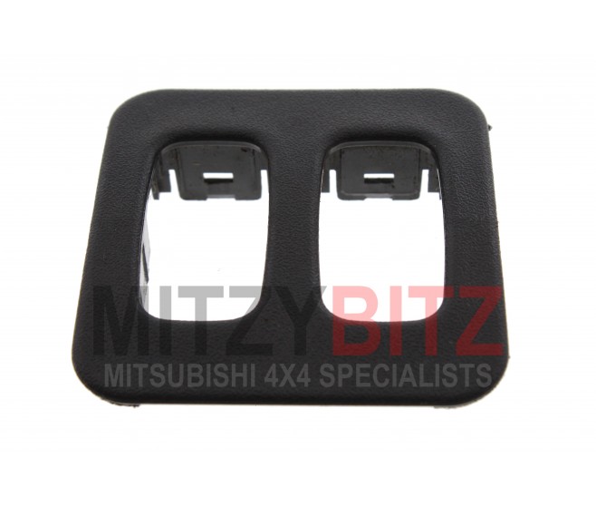 INSTRUMENT PANEL SWITCH HOLDER FOR A MITSUBISHI HEATER,A/C & VENTILATION - 