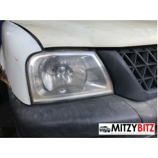 GENUINE FRONT RIGHT HEAD LAMP