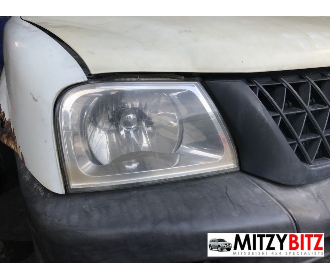 GENUINE FRONT RIGHT HEAD LAMP FOR A MITSUBISHI CHASSIS ELECTRICAL - 