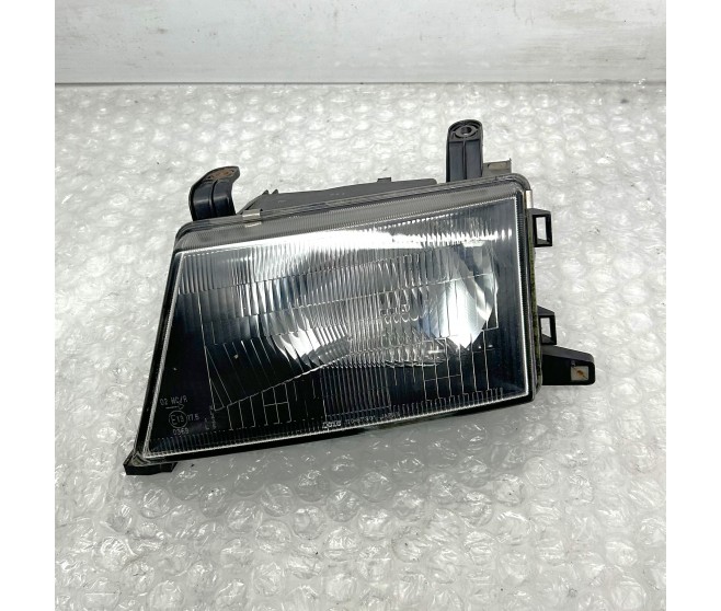 FRONT LEFT HEADLIGHT FOR A MITSUBISHI K90# - HEADLAMP