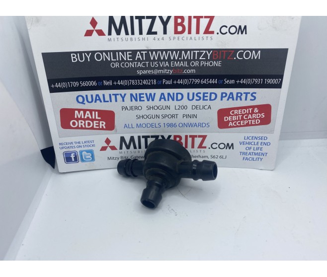 HEAD LAMP LIGHT WASHER CHECK VALVE FOR A MITSUBISHI CHASSIS ELECTRICAL - 