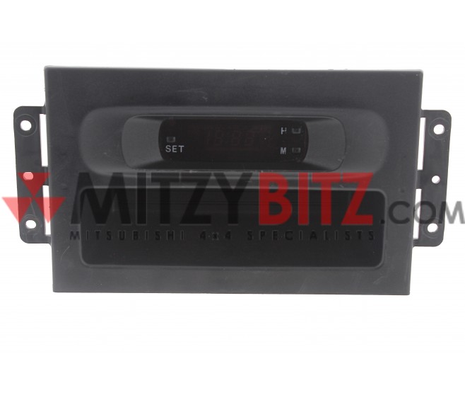 DIGITAL CLOCK AND SUROUND FOR A MITSUBISHI CHASSIS ELECTRICAL - 