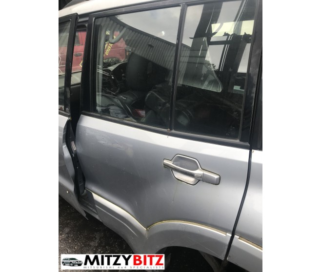 SILVER REAR LEFT  DOOR PANEL ONLY FOR A MITSUBISHI PAJERO/MONTERO - V78W