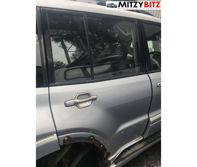 SILVER REAR RIGHT DOOR PANEL ONLY FOR A MITSUBISHI PAJERO/MONTERO - V78W