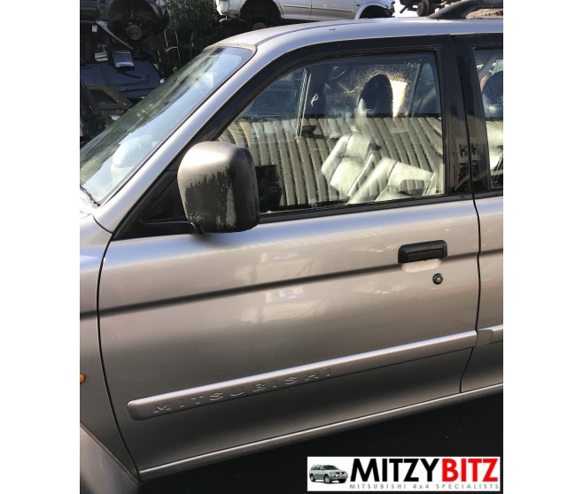 FRONT LEFT SILVER BARE DOOR PANEL ONLY FOR A MITSUBISHI MONTERO SPORT - K86W