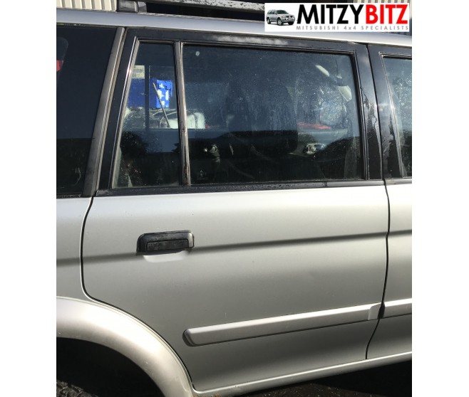 REAR RIGHT SILVER BARE DOOR PANEL ONLY FOR A MITSUBISHI MONTERO SPORT - K96W