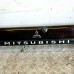 TAILGATE DOOR REFLECTOR TRIM FOR A MITSUBISHI MONTERO SPORT - K89W