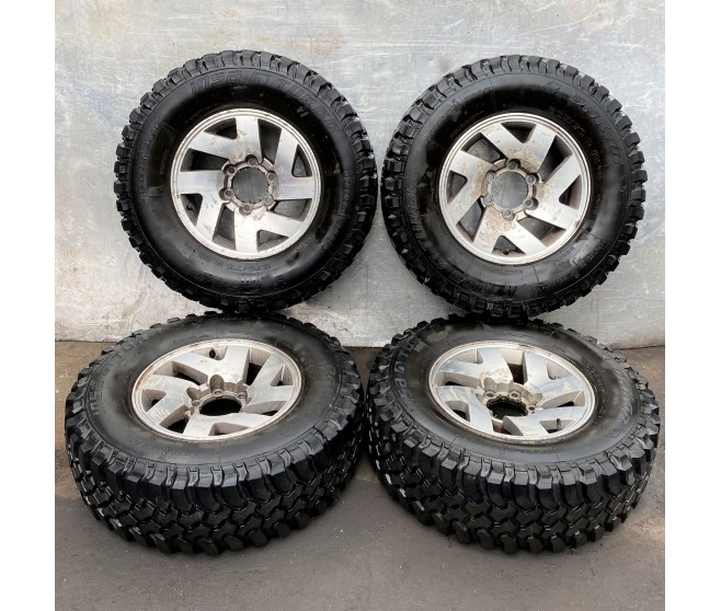 ALLOY WHEELS AND TYRES FOR A MITSUBISHI NATIVA - K99W
