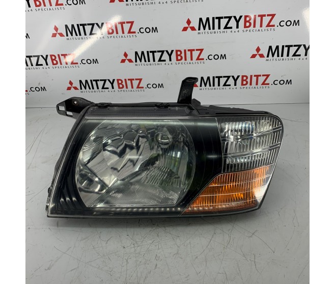 FRONT LEFT HEADLIGHT FOR A MITSUBISHI CHASSIS ELECTRICAL - 