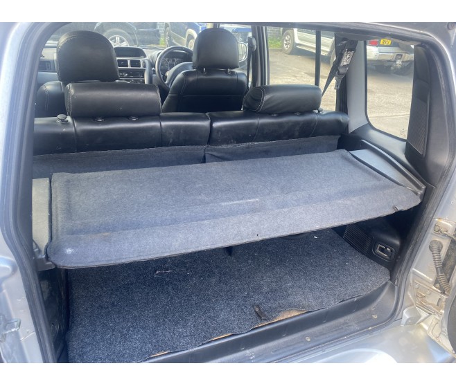COMPLETE PARCEL SHELF WITH SIDE BRACKETS FOR A MITSUBISHI PAJERO IO - H76W